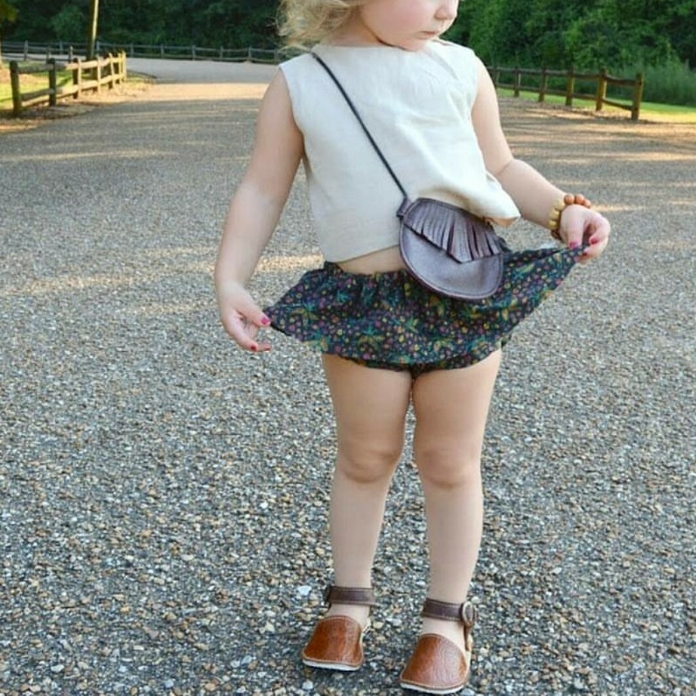 Boutique handmade child's burgundy leather bag